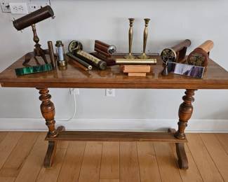 Large Selection of Kaleidoscopes atop a Walnut Hall Table.