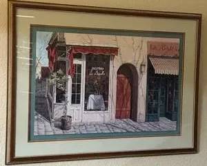 Framed Print of Bistro La Boule with Red Awnings and Streetscape
