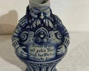 Blue Ceramic Pitcher with German Text and Detailed Figural Design