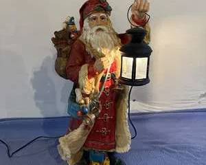 Christmas Santa Claus Figure with Lantern and Gifts