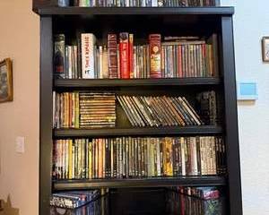 Extensive Collection of DVDs and Books Featuring Stephen King and Classic Literature