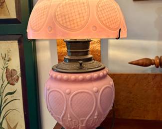 Pink satin antique oil lamp with tennis rackets