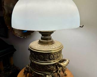Antique brass figural oil lamp