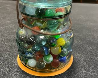 Vintage marbles in Atlas jar