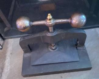 Antique cast iron and brass book press