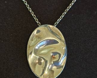 Tiffany & Co Elsa Peretti sterling silver "Leo" pendant necklace.