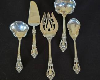 Sterling: Lunt "Eloquence" serving set. There is one additional piece that did not make it in the picture.