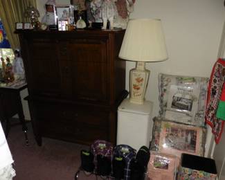 Dresser, Lamp, Shoes, Shirts and Comforters.