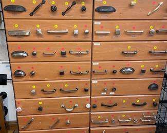 Examples of cabinet hardware, various prices, pricing starts at $1 each