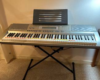 #23 - $250 - Casio WK - 200 keyboard with stand 30tx46wx15d
