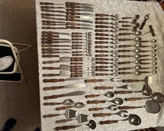 #28C - $150 - WMF Cromargan flatware with wooden handles