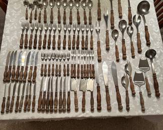 #28C - $150 - WMF Cromargan flatware with wooden handles