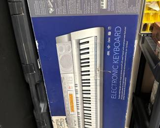 #23 - $250 - Casio WK - 200 keyboard with stand 30tx46wx15d
