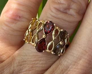 #84 - $220- 10kt gold ring w/citrine/smoky topaz/garnet sz7
