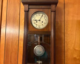#8 - $150 - Continental Art deco wall clock with key 30tx12wx6d as is
