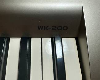 #23 - $250 - Casio WK - 200 keyboard with stand 30tx46wx15d