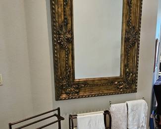 Very nice hanging wall mirror. Be sure to measure your wall before you buy this puppy cuz its big.