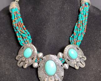 Turquoise Colored Bead Necklace With Silver Colored Elements