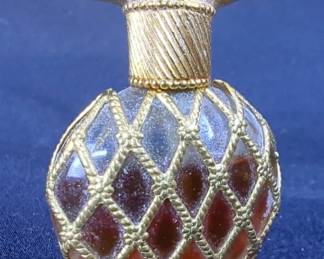 Jewelry Including Magnetic Necklaces, Gold Tone Pendants, Nina Ricci Perfume Bottle and More