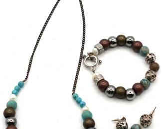 matching jewelry set: bracelet, necklace, and earrings