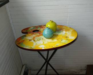 Artistic table with two ceramic vases asking price of $ 25.00 or best offer