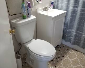 Updated commode; petite sink