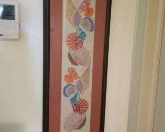 Shell framed needlepoint