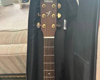 New Yamaha Guitar with case
