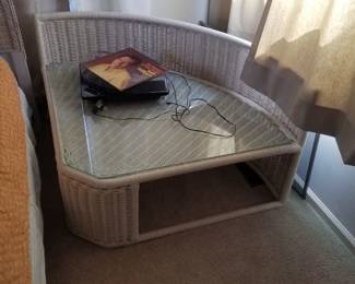 Glass top wicker storage table