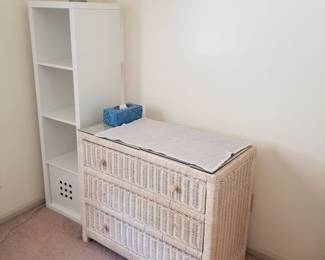 3-drawer wicker dresser; shelf unit; table lamp