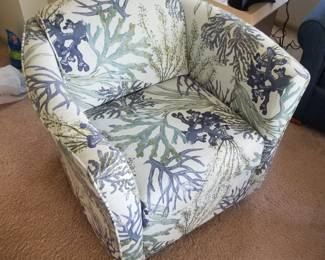 Upholstered arm chair swivels!