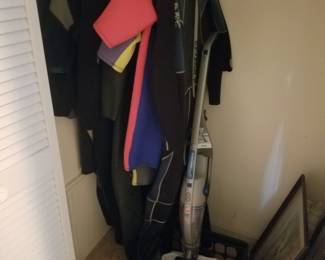 Wetsuits; vacuum cleaners