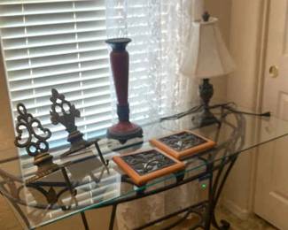 Metal Console Table Base With Glass Slab Along With Various Home Decor