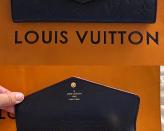 Authentic Louis Vuitton wallet in excellent condition.
