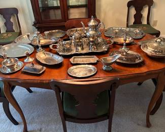 Antique dining table, 6 antique chairs, lots of silver items