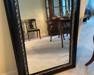 Large black and gold mirror
