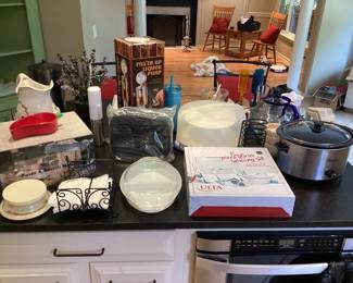 Crockpot, serving pieces, and other various kitchen items