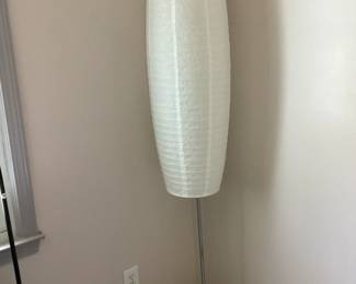 White tube shapped floor lamp