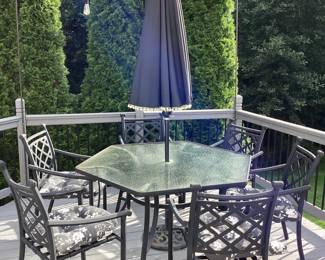 Wrought Iron patio table and chairs with umbrella