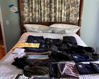 Men’s accessories on antique tiger maple four poster bed