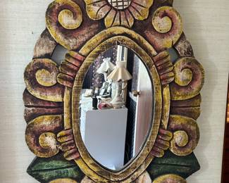 Interesting carved mirror