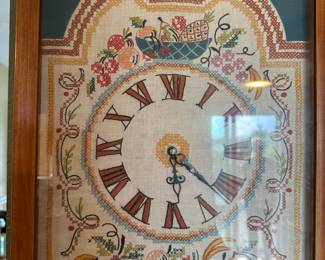 Vintage Framed crewel wall-clock.