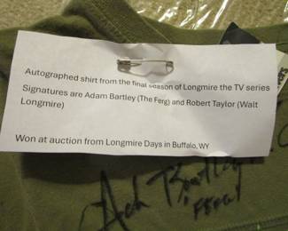 Autographed shirt from final season of TV Series Longmire signed by Adam Bartley and Robert Taylor.