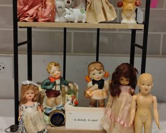 Dolls, salt shakers, prisms, other miscellaneous.