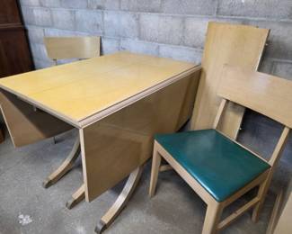 Blond mahogany dining table