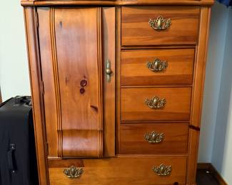 King size bed, set of end tables, dresser with mirror, wardrobe, lingerie chest - all matching but sold separately. 