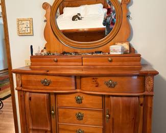 King size bed, set of end tables, dresser with mirror, wardrobe, lingerie chest - all matching but sold separately. 