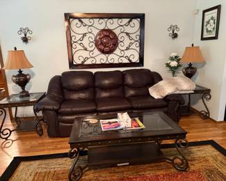 Leather 3 cushion sofa; end table set; coffee table; wall decor