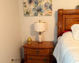King size bed, set of end tables, dresser with mirror, wardrobe, lingerie chest - all matching but sold separately. 