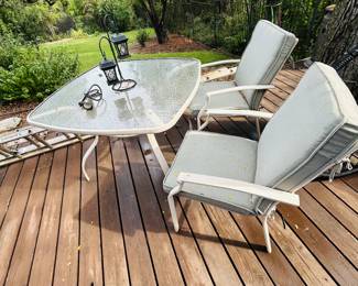 Patio table and chairs. There are a total of 4 chairs